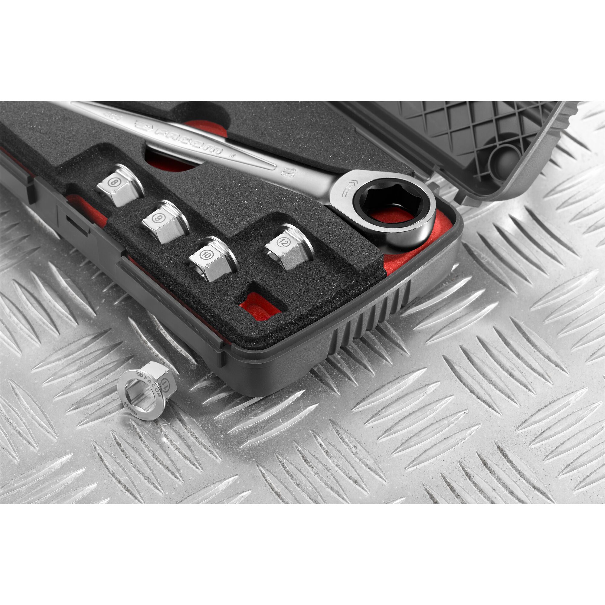 Facom 464J1 ratcheting wrench set in black case with five sockets, angled view.